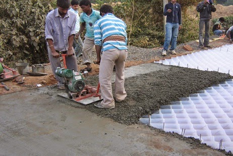 Laying of Cell filled Concrete Pavement